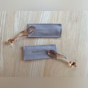 Set of two Amore Pacific skincare scoops